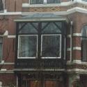 Vervangen kozijnen en hekwerk woonhuis Vondelpark te Amsterdam.